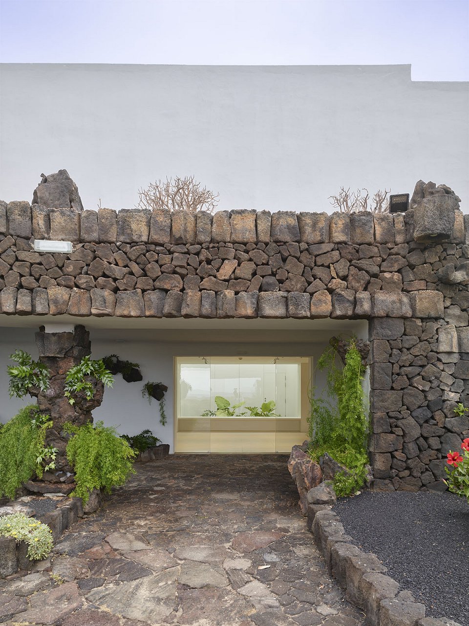 GPY Arquitectos. The New Casa de Los Volcanes Exhibition Space. Gallery Entrance. Photograph: Roland Halbe